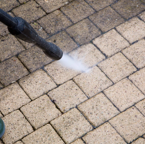 before and after pressure washing pavers